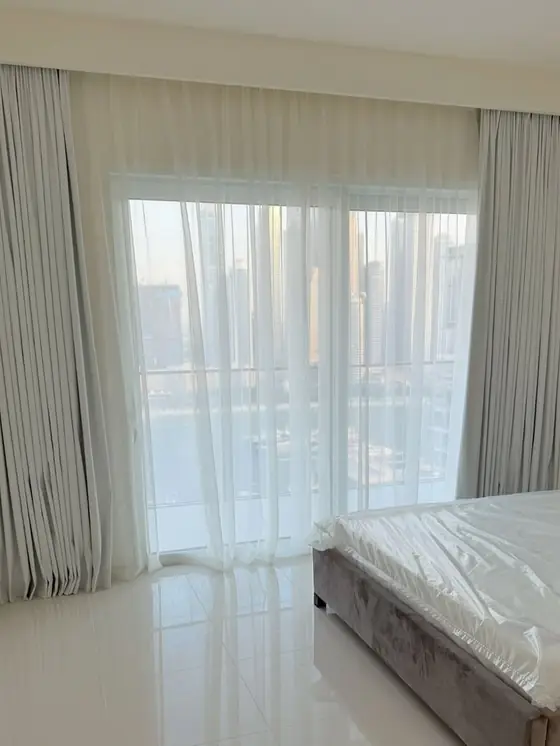 Emaar Beachfront Residence - curtains and blinds installation in Palm Jumeirah