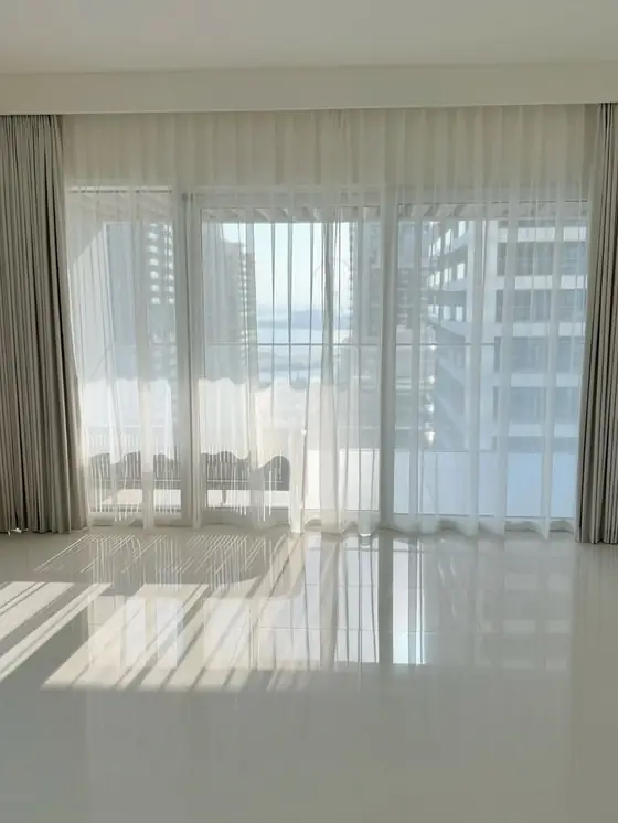 Emaar Beachfront - curtains and blinds installation in Palm Jumeirah
