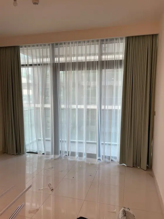 Isle Tower - curtains and blinds installation in Palm Jumeirah