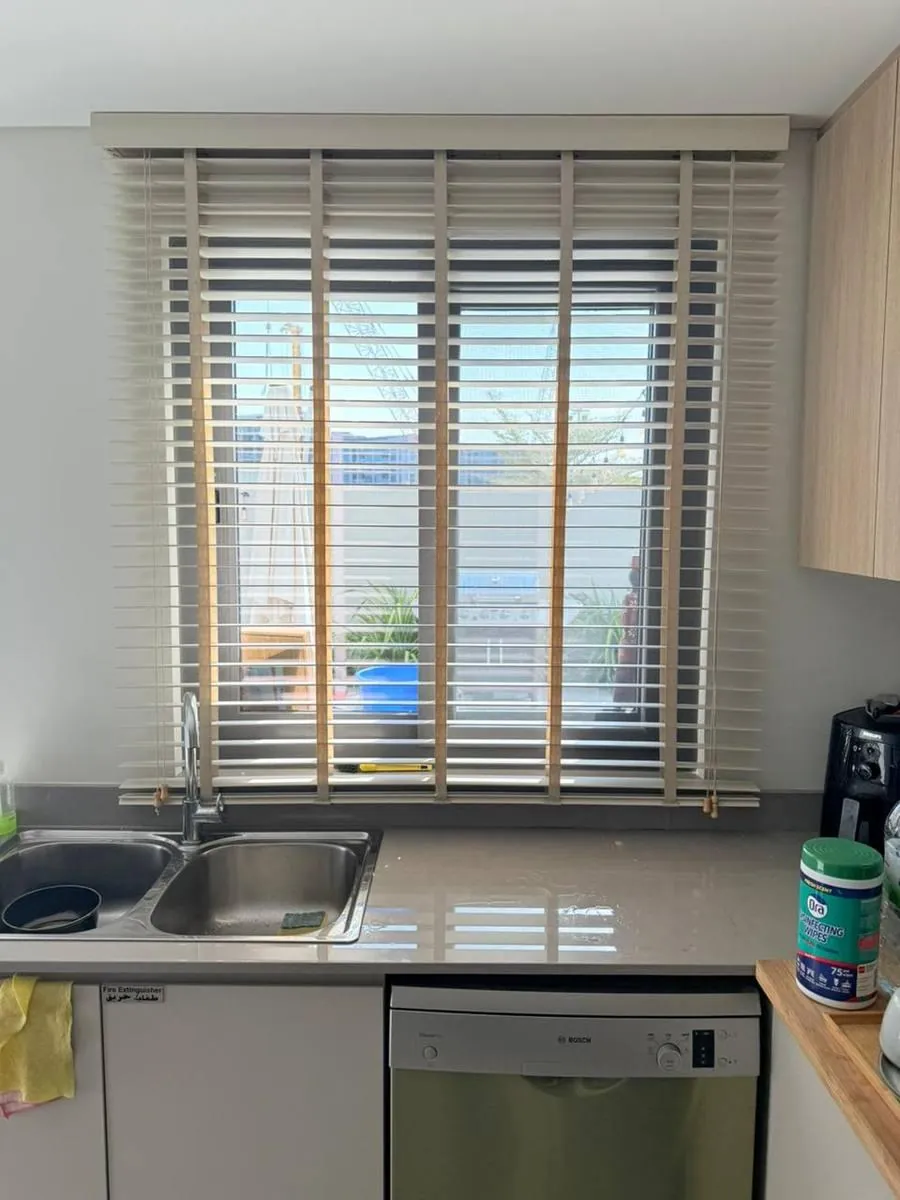 Illustration of warm wooden venetian blinds with tilted slats